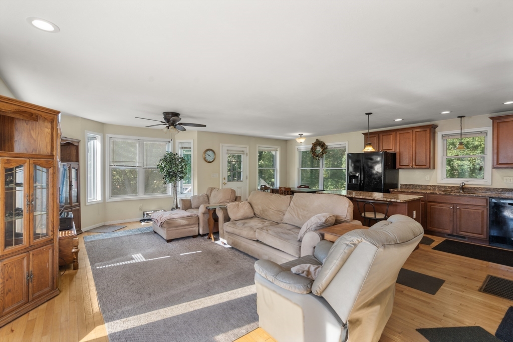 190 Old Road Dracut, MA 01826 - Photo 28 of 36 a living room with furniture and a flat screen tv