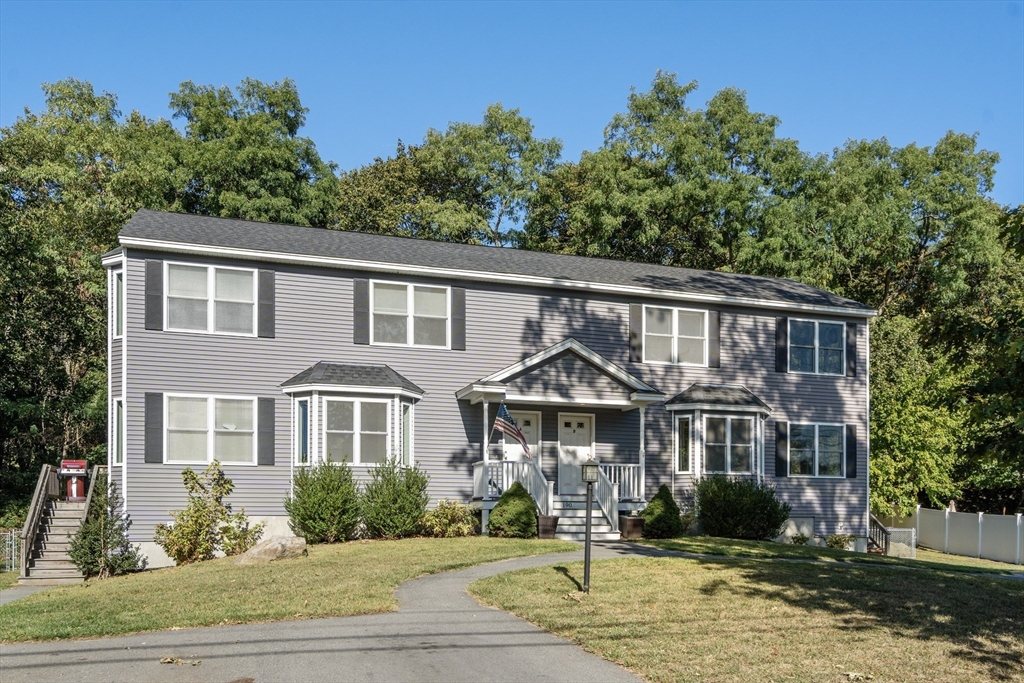 190 Old Road Dracut, MA 01826 - Photo 30 of 36 a front view of a house with a yard
