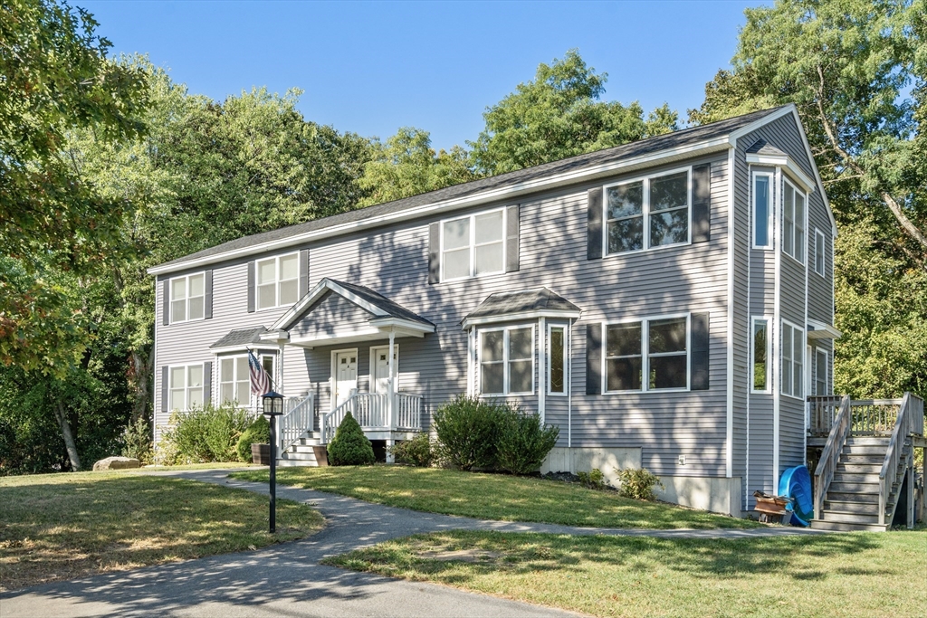 190 Old Road Dracut, MA 01826 - Photo 31 of 36 a front view of a house with a yard