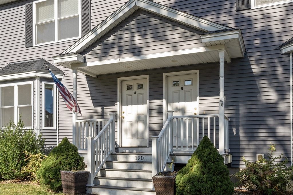 190 Old Road Dracut, MA 01826 - Photo 32 of 36 a front view of a house with a porch