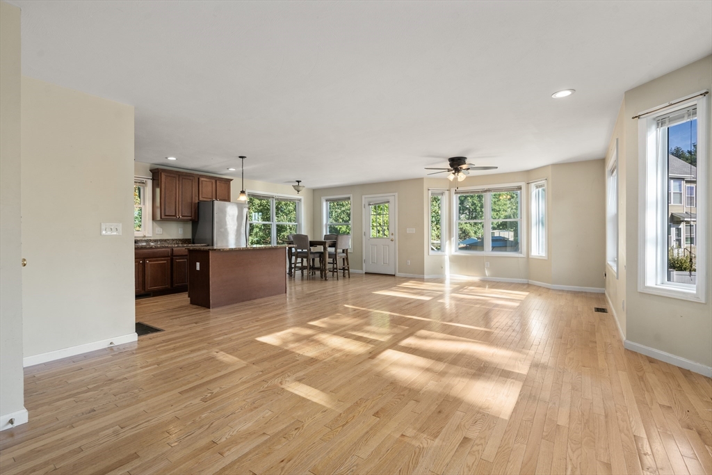 190 Old Road Dracut, MA 01826 - Photo 6 of 36 a view of a livingroom with furniture hardwood floor and a window