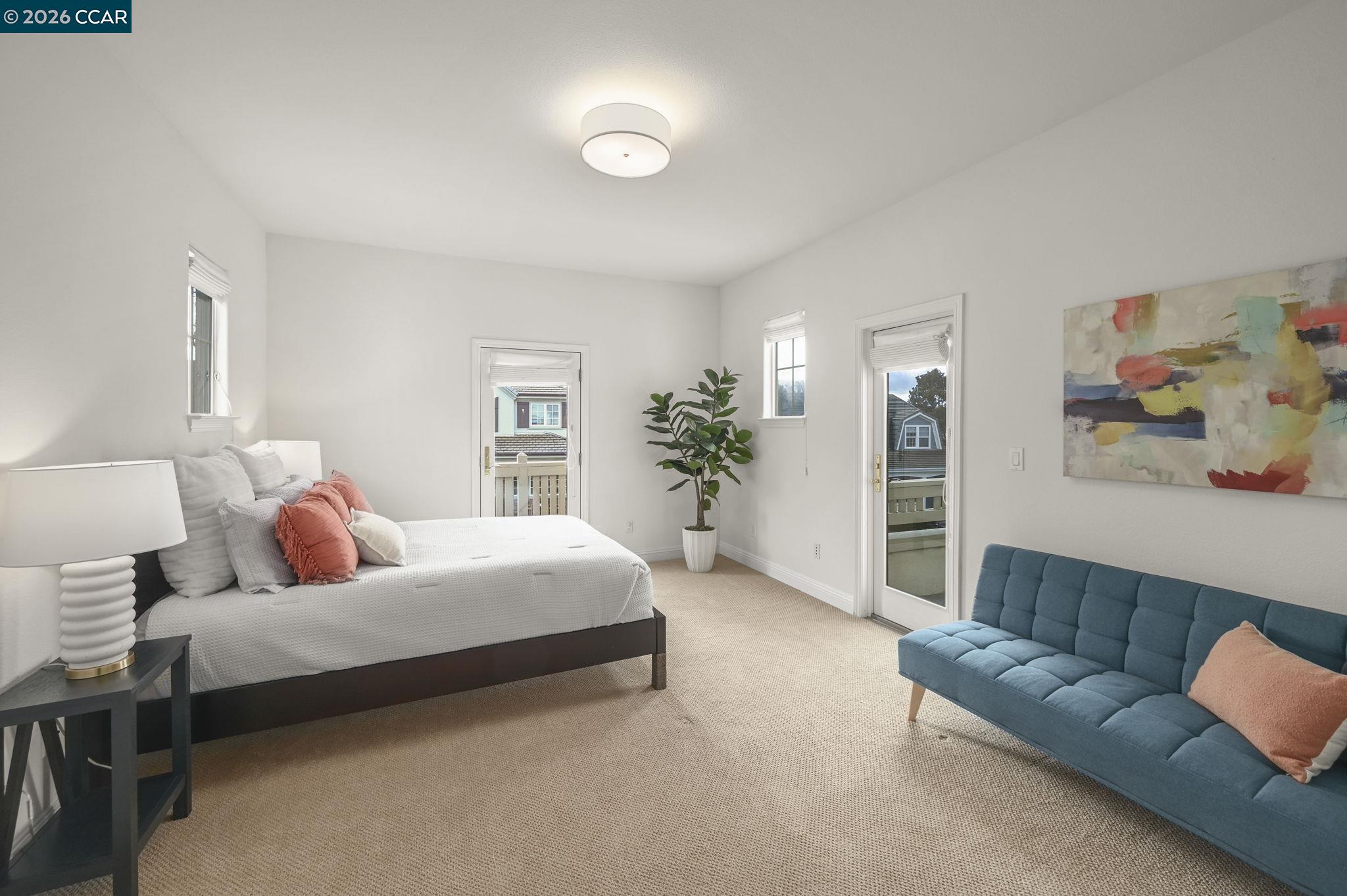 135 Diablo Ranch Court Danville, CA 94506 - Photo 39 of 60 a bedroom with a bed couch and a potted plant