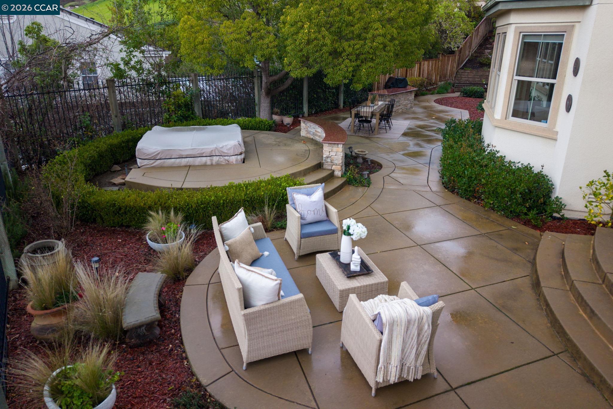 135 Diablo Ranch Court Danville, CA 94506 - Photo 46 of 60 a view of a patio with couches table and chairs potted plants and large tree