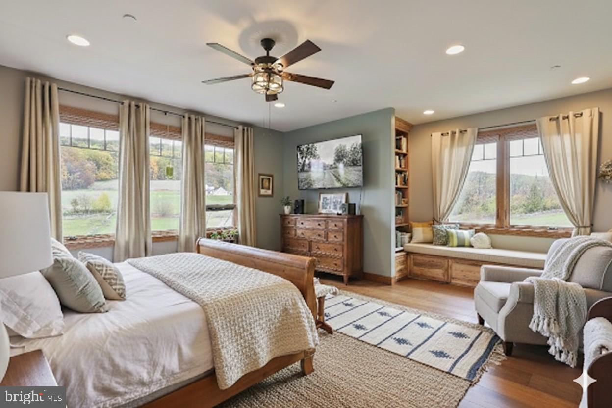 13167 Salem Church Road Hagerstown, MD 21740 - Photo 8 of 10 a bedroom with a large bed and a large window