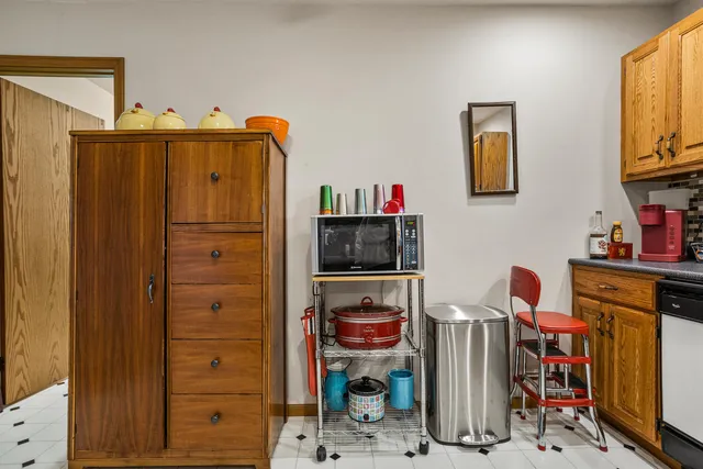 a utility room with closet dryer and washer