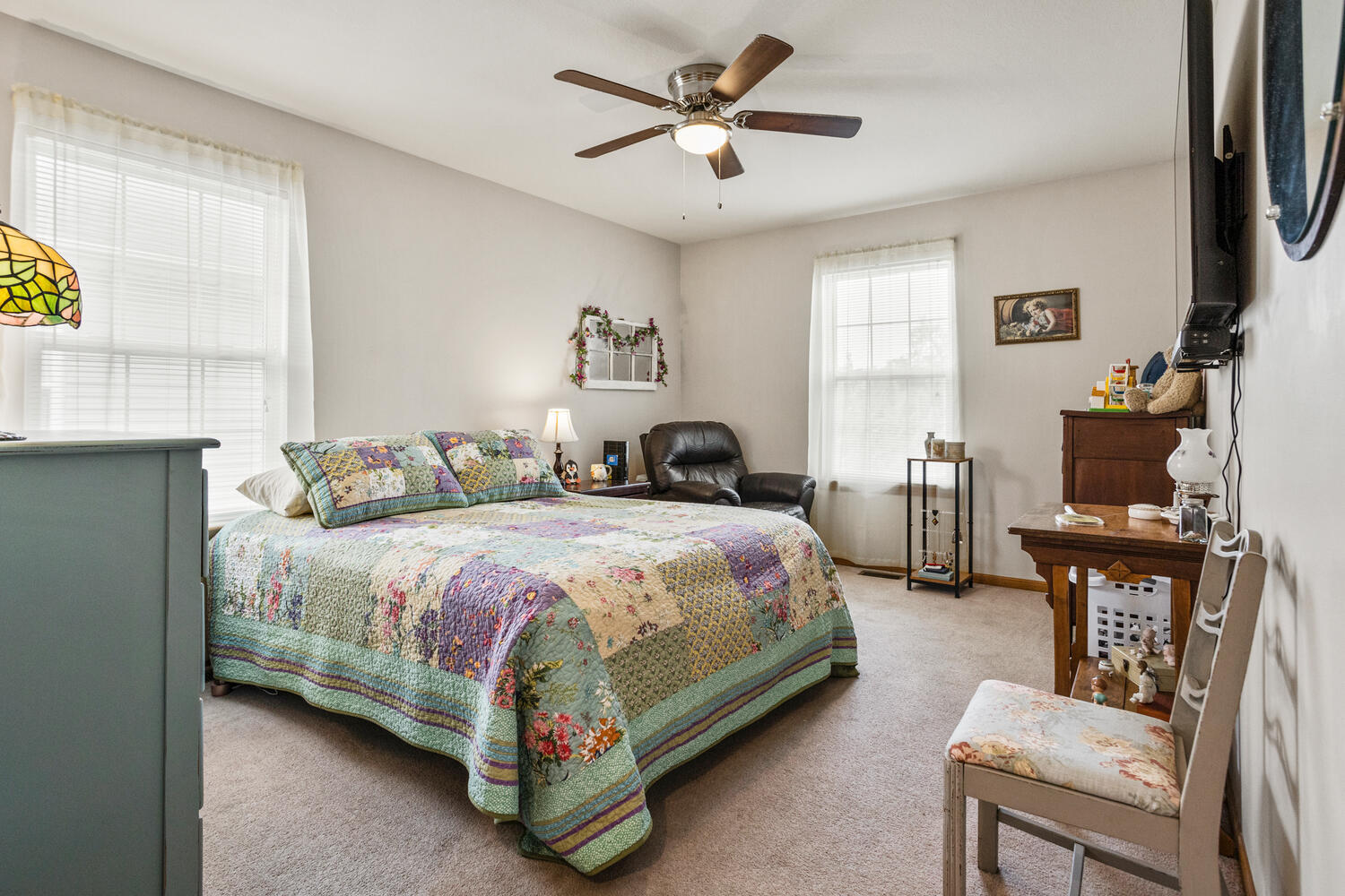 709 Erin Drive Champaign, IL 61822 - Photo 14 of 30 a bedroom with a bed and a television