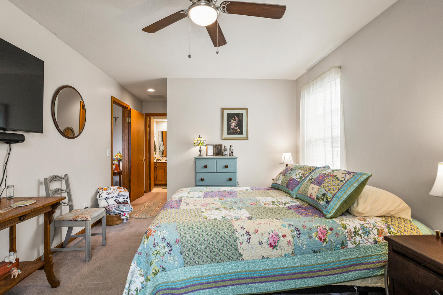 709 Erin Drive Champaign, IL 61822 - Photo 15 of 30 a bedroom with a bed and wooden floor