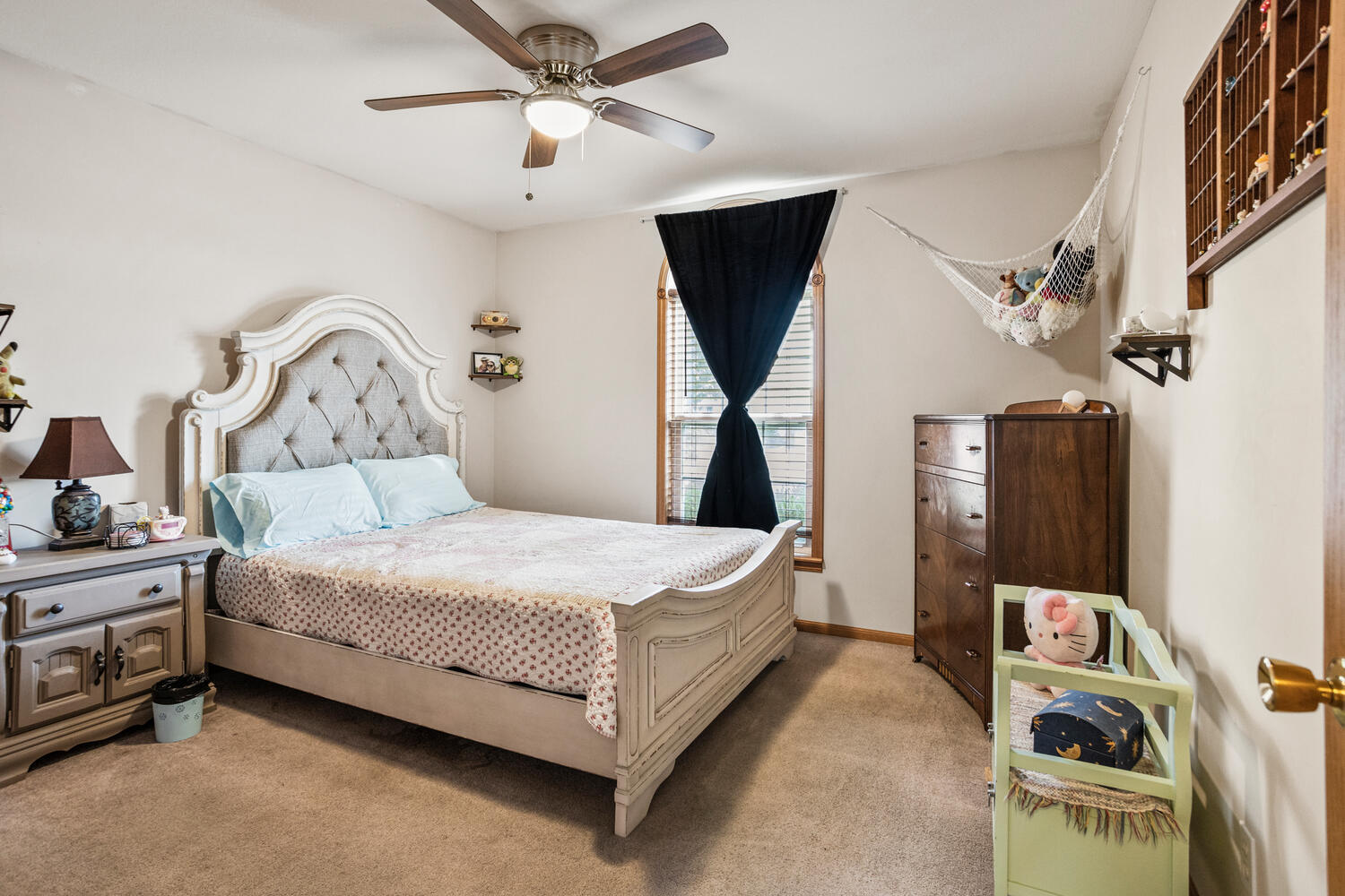 709 Erin Drive Champaign, IL 61822 - Photo 18 of 30 a bed room with a bed and a chandelier