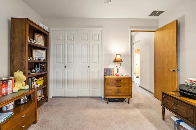 a view of room with toys and closet