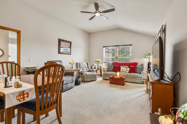 a bedroom with furniture and a window