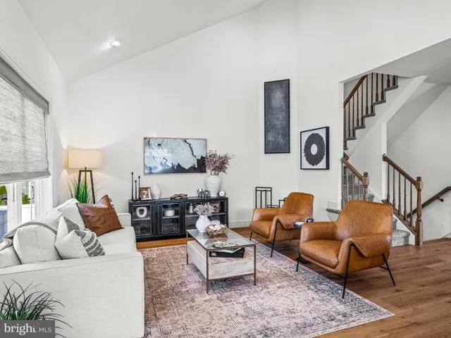 a living room with furniture and a couch