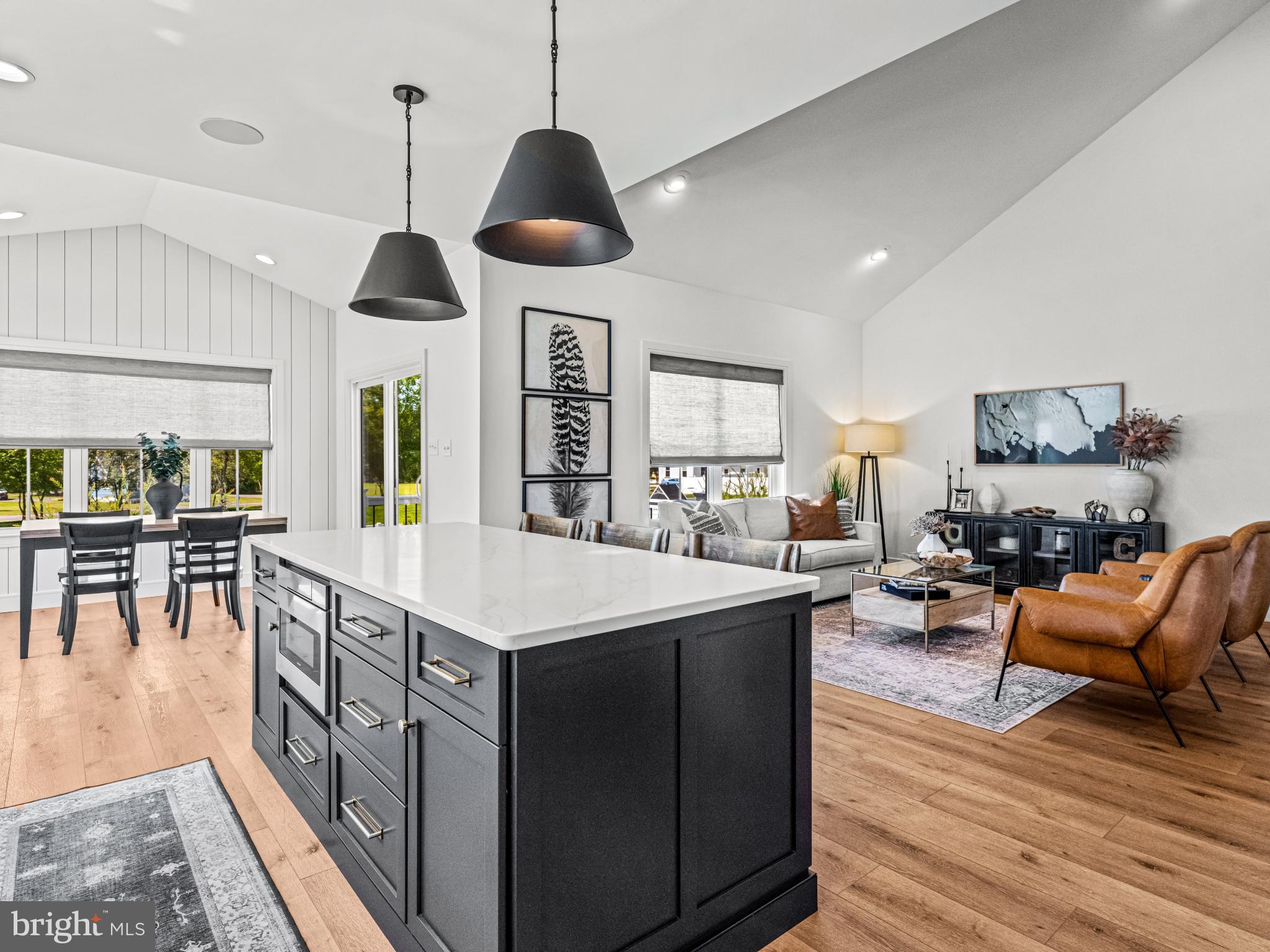3455 C Durham Road Doylestown, PA 18902 - Photo 12 of 21 a kitchen with stainless steel appliances granite countertop a stove and a wooden floors