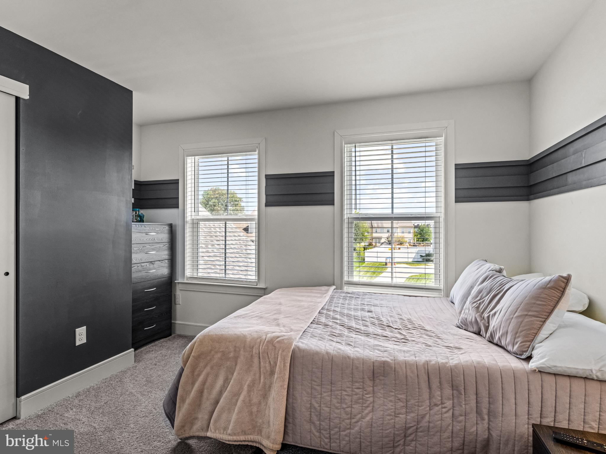 3455 C Durham Road Doylestown, PA 18902 - Photo 21 of 21 a bedroom with a bed and a window