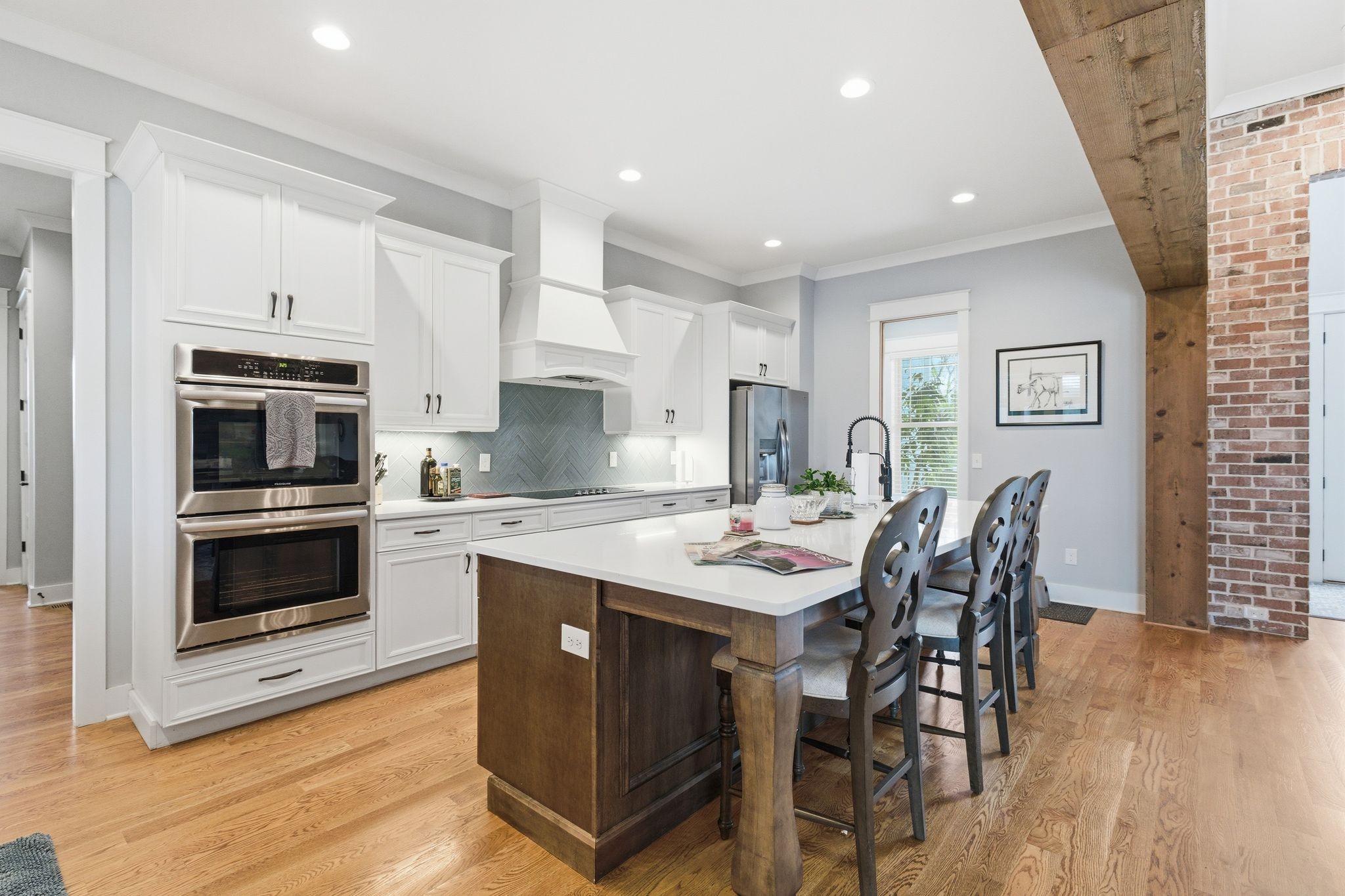 8516 Lowe Christiana Road Christiana, TN 37037 - Photo 21 of 53 a kitchen with stainless steel appliances kitchen island granite countertop a stove a sink a microwave and a dining table