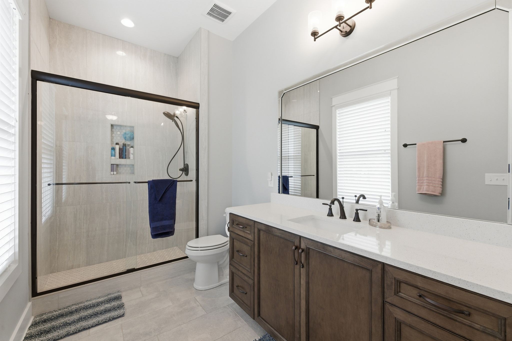 8516 Lowe Christiana Road Christiana, TN 37037 - Photo 31 of 53 a bathroom with a double vanity sink mirror and toilet