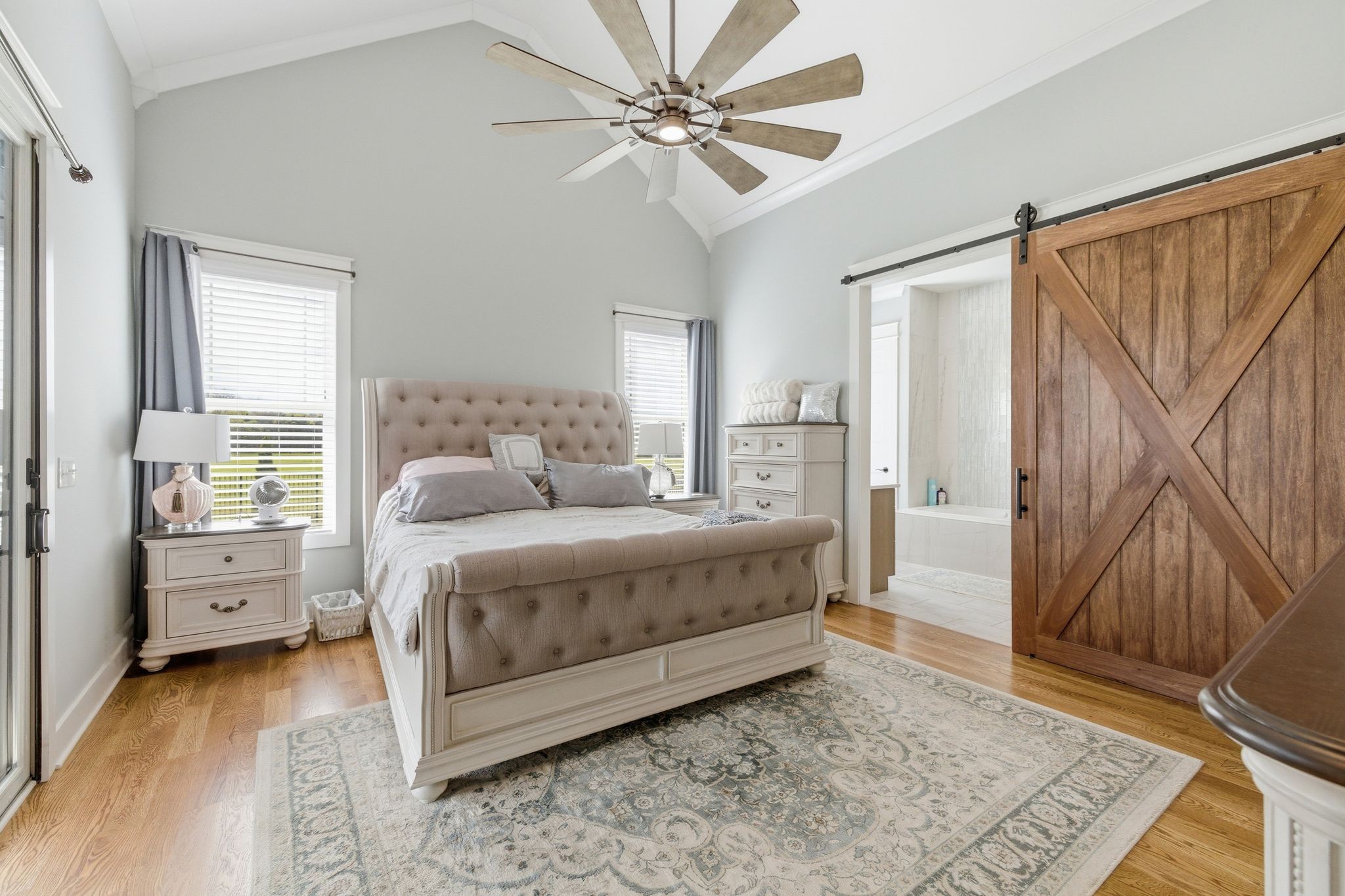 8516 Lowe Christiana Road Christiana, TN 37037 - Photo 34 of 53 a spacious bedroom with a bed and a dresser