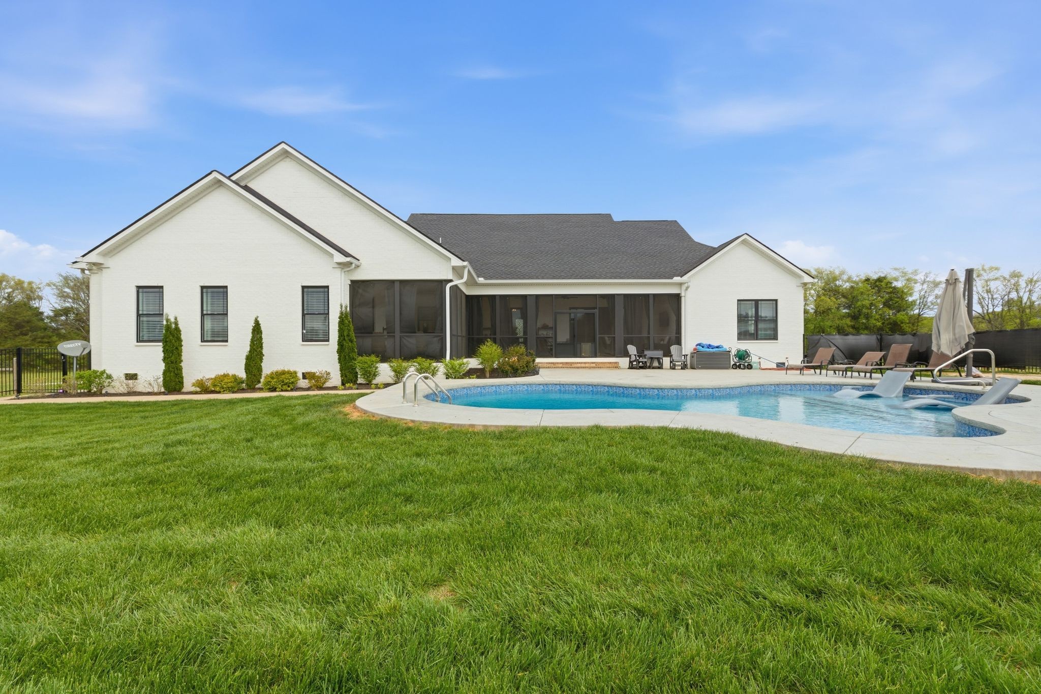 8516 Lowe Christiana Road Christiana, TN 37037 - Photo 41 of 53 a view of a house with a backyard patio and swimming pool