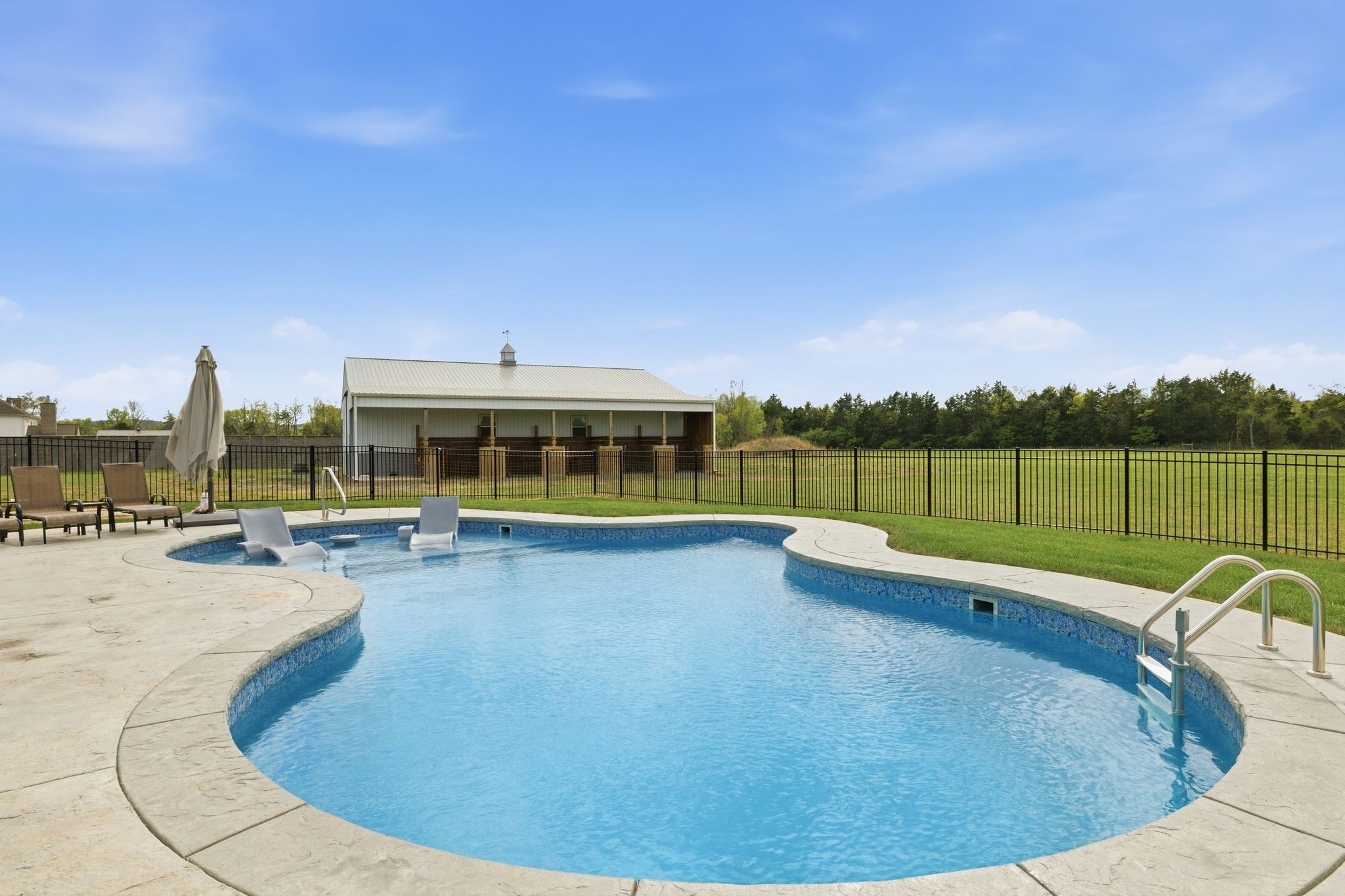 8516 Lowe Christiana Road Christiana, TN 37037 - Photo 42 of 53 a view of a swimming pool with a patio