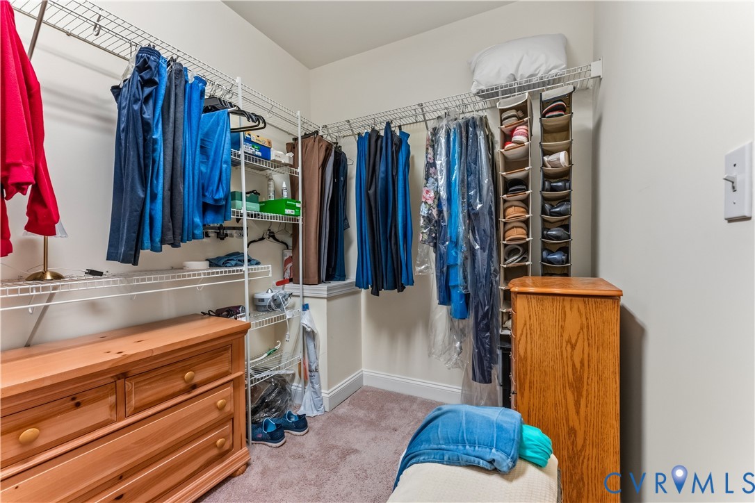 270 Petersburg Road Powhatan, VA 23139 - Photo 41 of 90 a view of walk in closet with clothes and shoes