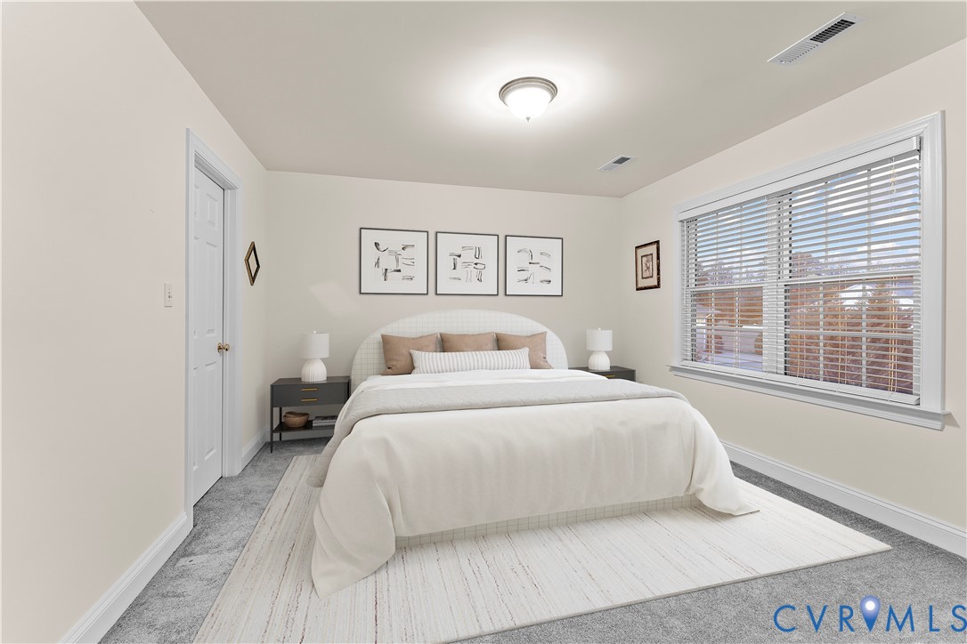 270 Petersburg Road Powhatan, VA 23139 - Photo 57 of 90 a bedroom with a bed and a large window