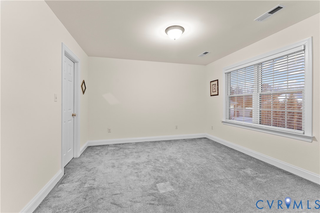 270 Petersburg Road Powhatan, VA 23139 - Photo 58 of 90 an empty room with a empty space and windows