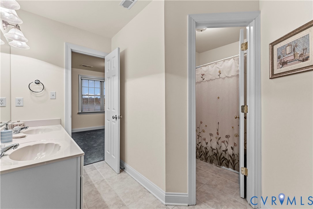 270 Petersburg Road Powhatan, VA 23139 - Photo 60 of 90 a bathroom with a sink and a mirror