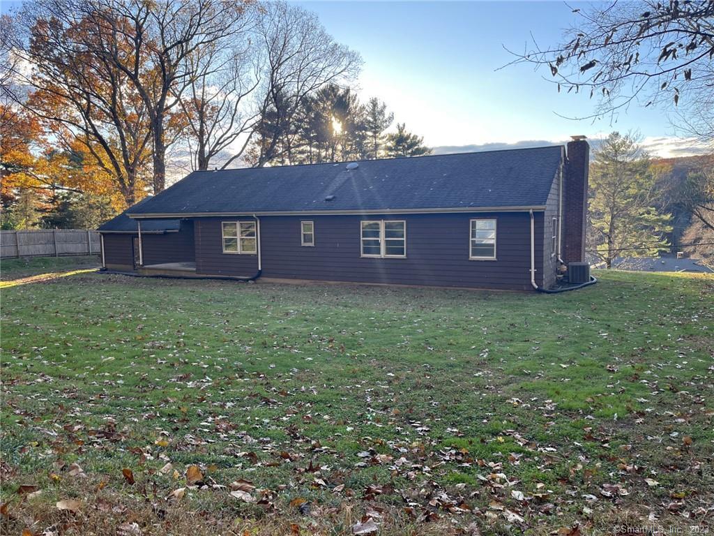 106 Pinewood Trail Trumbull, CT 06611 - Photo 1 of 1 front view of house with a yard