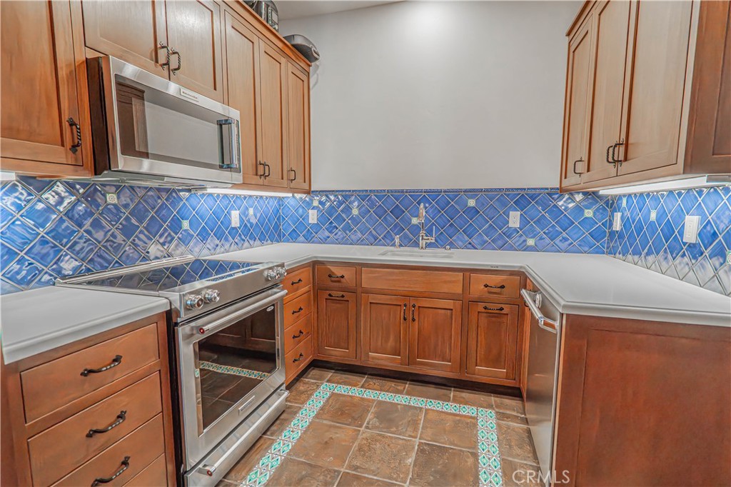 3030 Templeton Road Templeton, CA 93465 - Photo 17 of 75 Beyond the main kitchen lies a fully equipped Butler's kitchen, offering an extra oven, cooktop, dishwasher, and microwave — perfect for hosting or keeping the main space clutter-free.