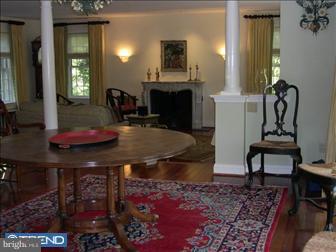600 Crum Creek Road Media, PA 19063 - Photo 2 of 12 a living room with furniture a fireplace and a potted plant