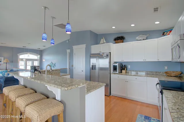 $1,050,000 | 1404 East Dolphin Drive, Oak Island, NC 28465