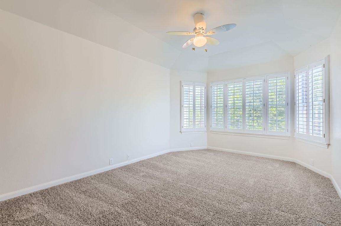 3423 Shiraz Loop Round Rock, TX 78665 - Photo 21 of 28 a view of an empty room with a window