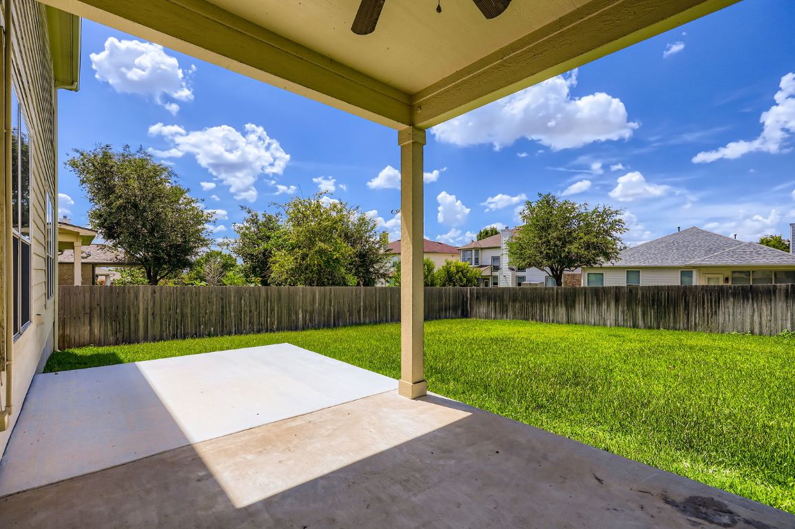 3423 Shiraz Loop Round Rock, TX 78665 - Photo 26 of 28 a view of a backyard with a swimming pool