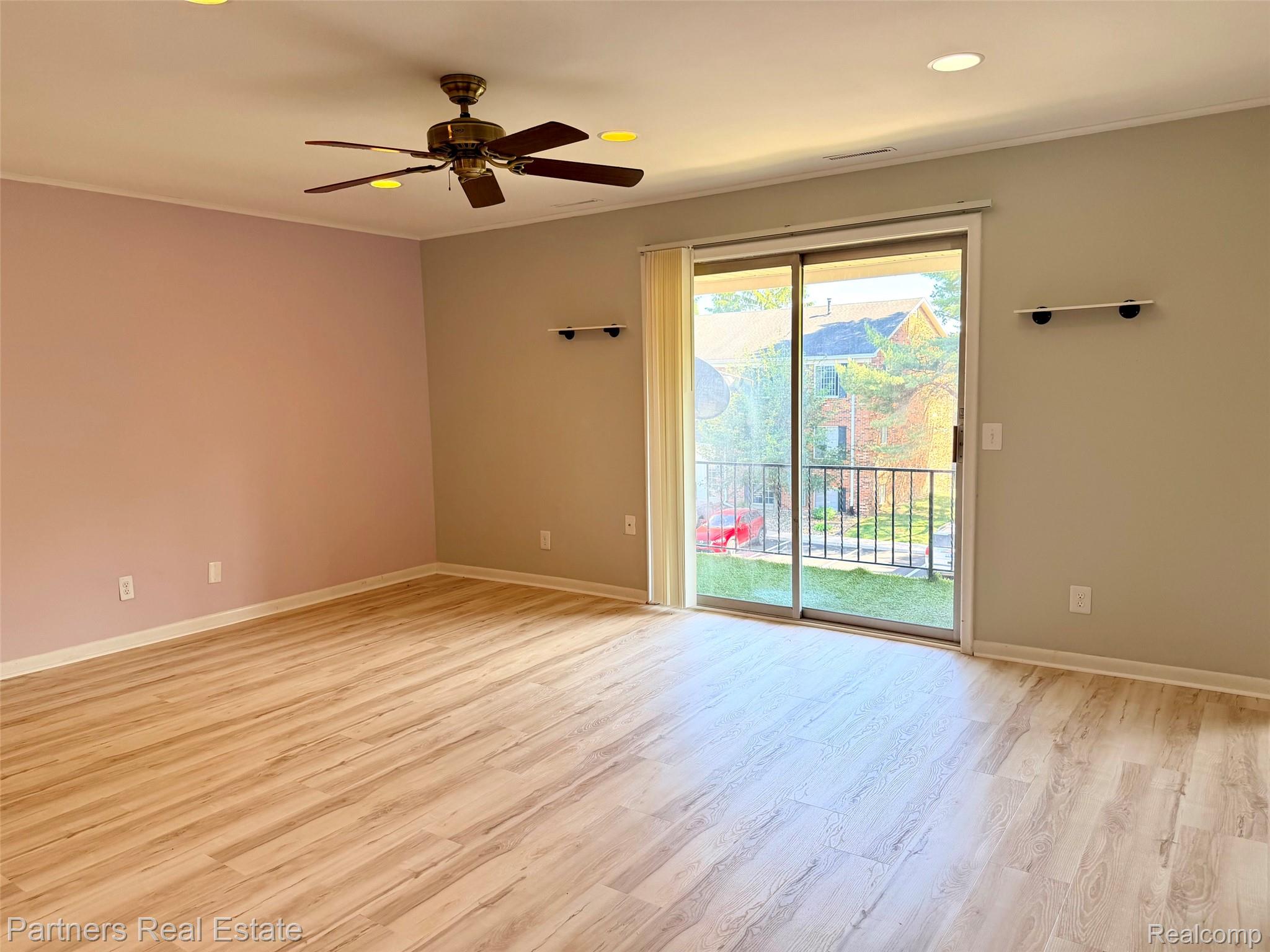 507 West Highland Road, Unit 11 Howell, MI 48843 - Photo 5 of 29 Sliding door to Balcony