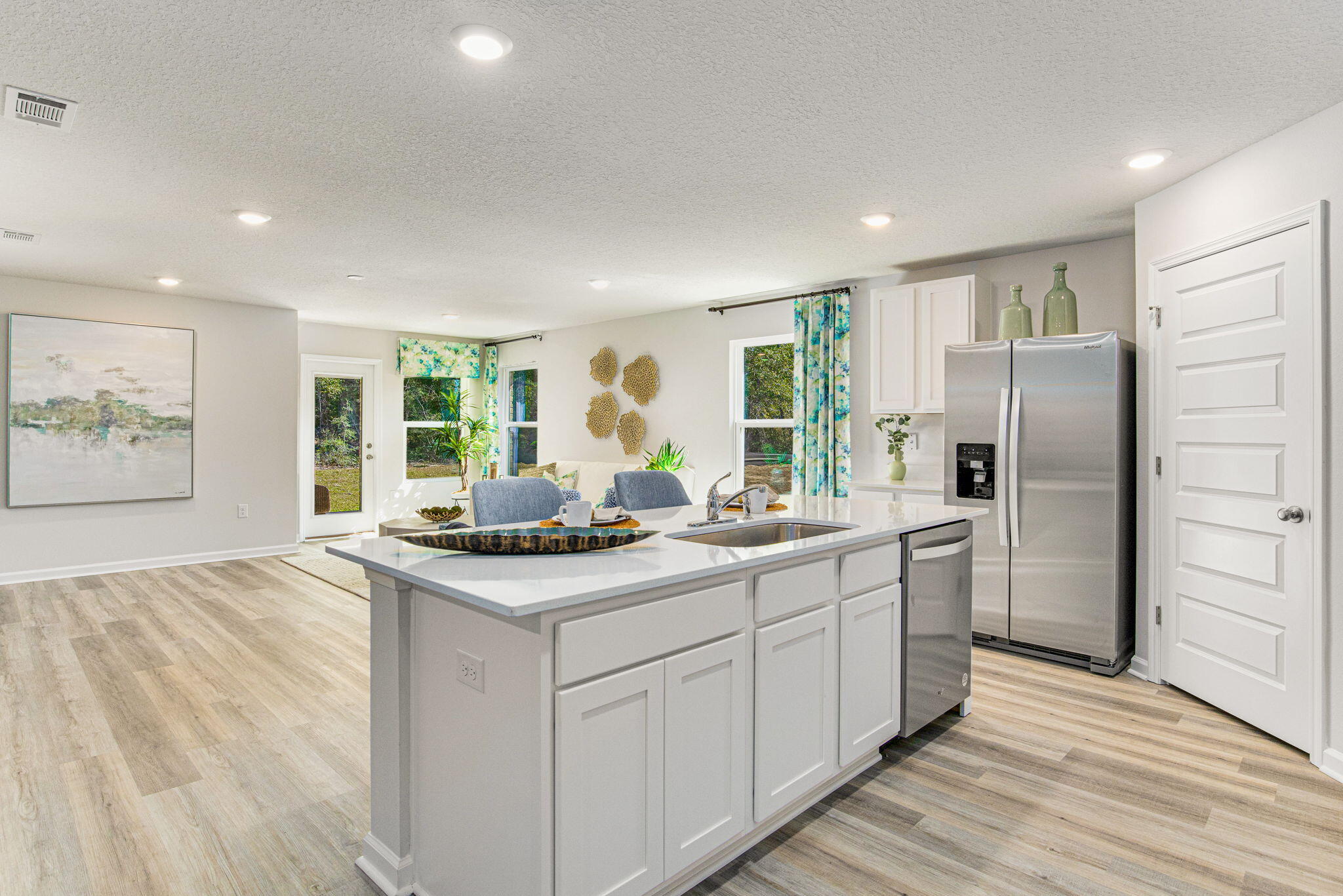 4418 Marine Loop Crestview, FL 32539 - Photo 20 of 35 a kitchen with stainless steel appliances granite countertop a refrigerator a sink a stove and oven