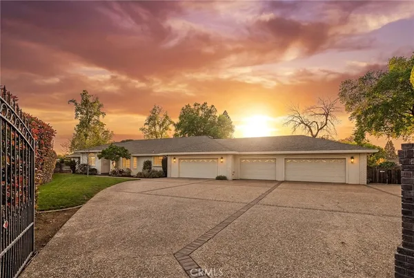 a view of a house with a big yard