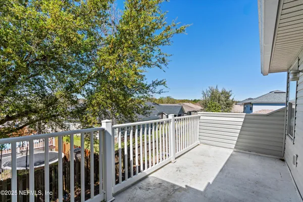 a view of a wooden fence
