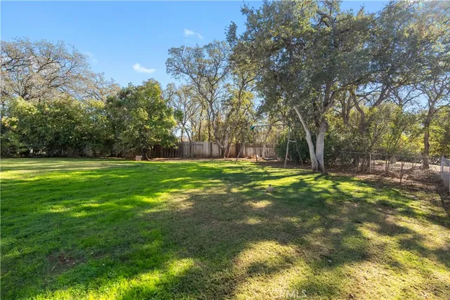 a view of a house with a big yard
