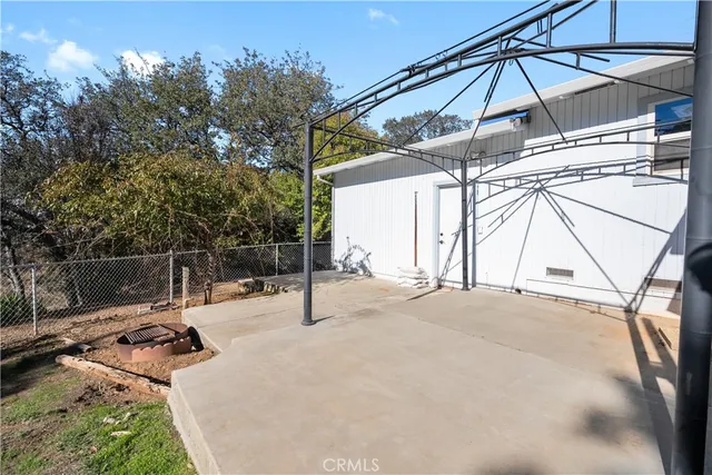 a view of a park with large trees