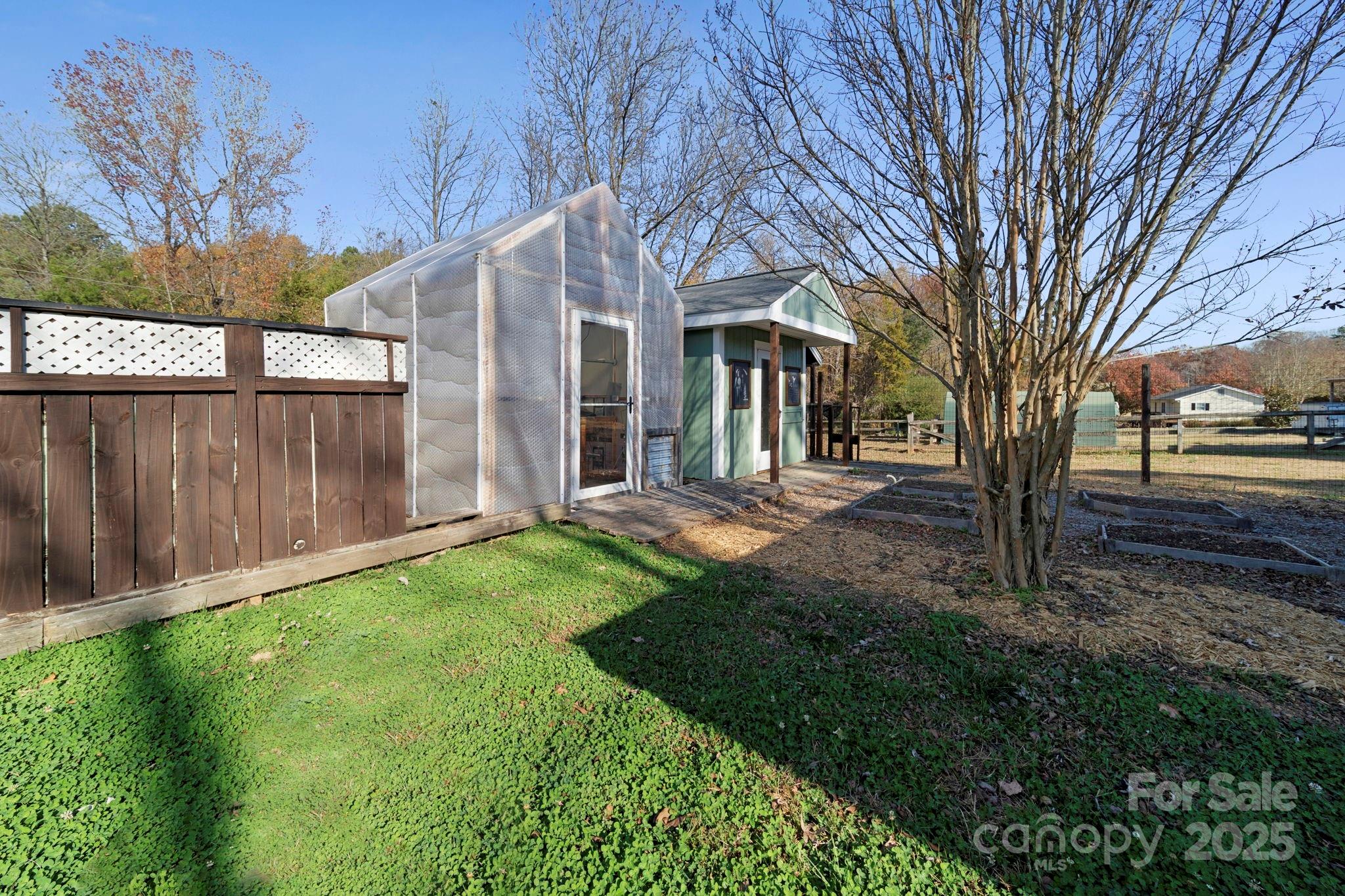 3400 Griffith Road Monroe, NC 28112 - Photo 12 of 46 a backyard of a house with lots of green space