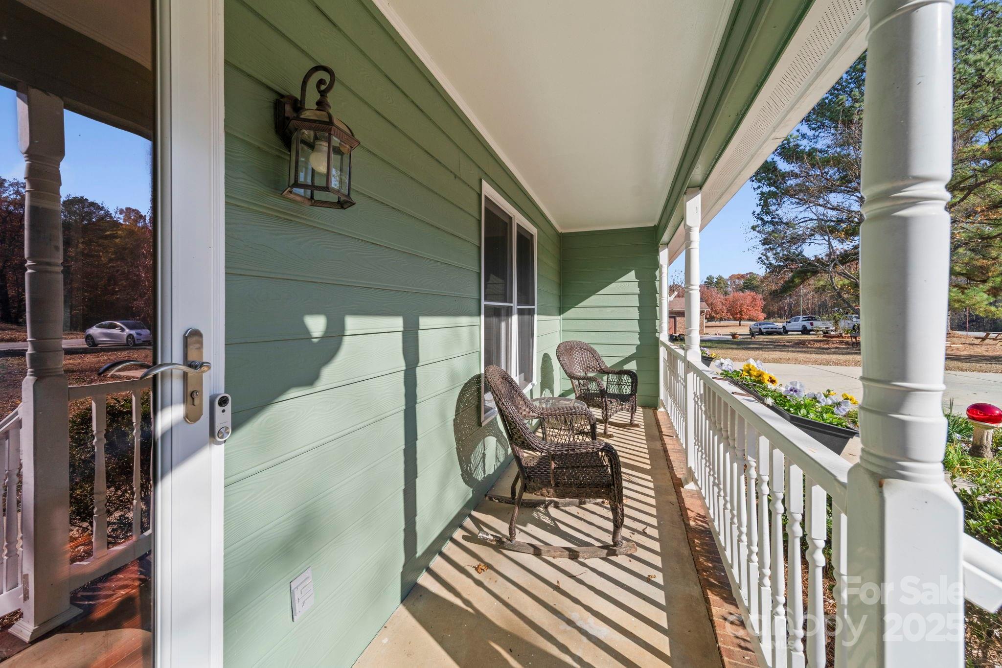 3400 Griffith Road Monroe, NC 28112 - Photo 14 of 46 a view of a balcony with furniture