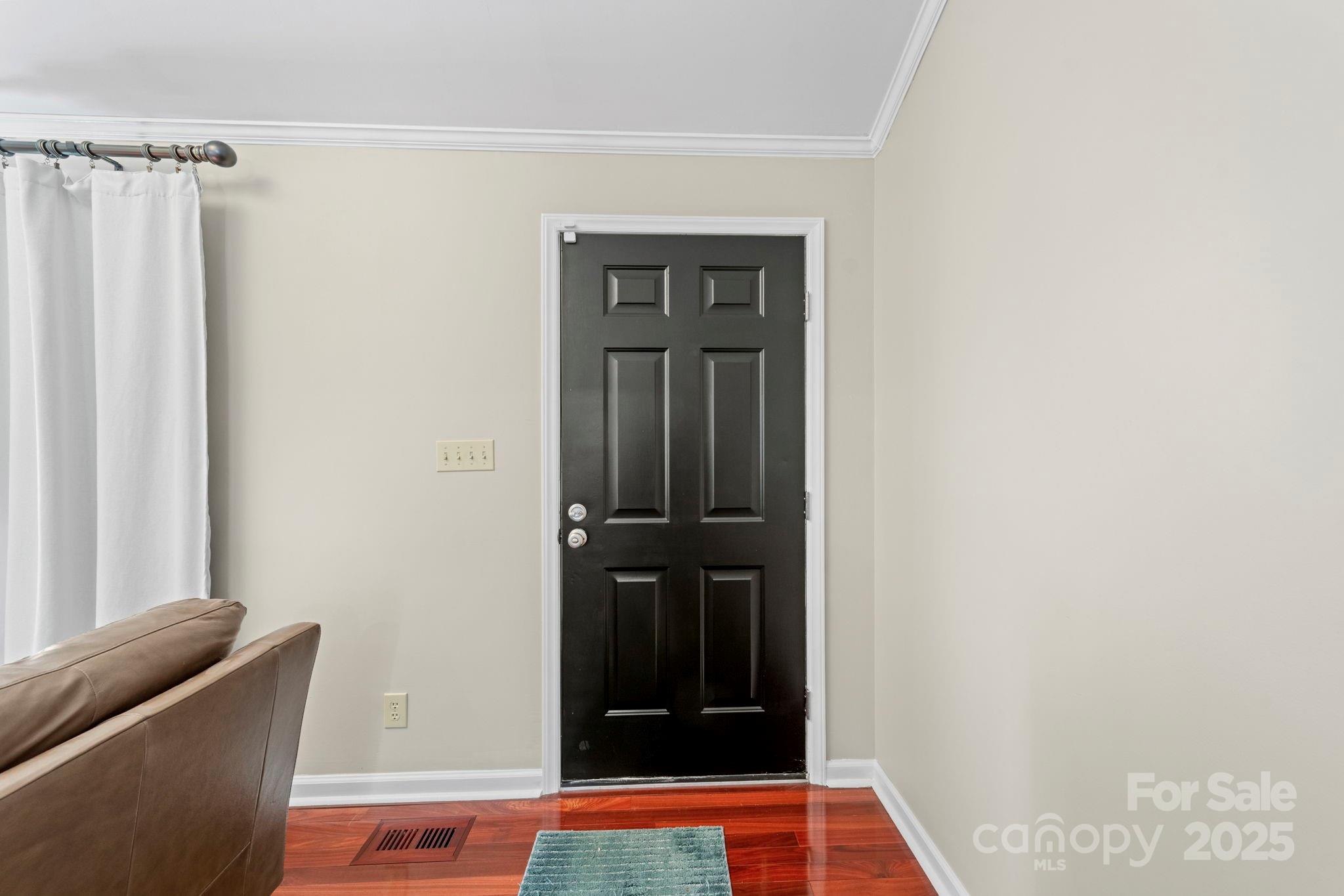 3400 Griffith Road Monroe, NC 28112 - Photo 15 of 46 a view of an entryway with wooden floor