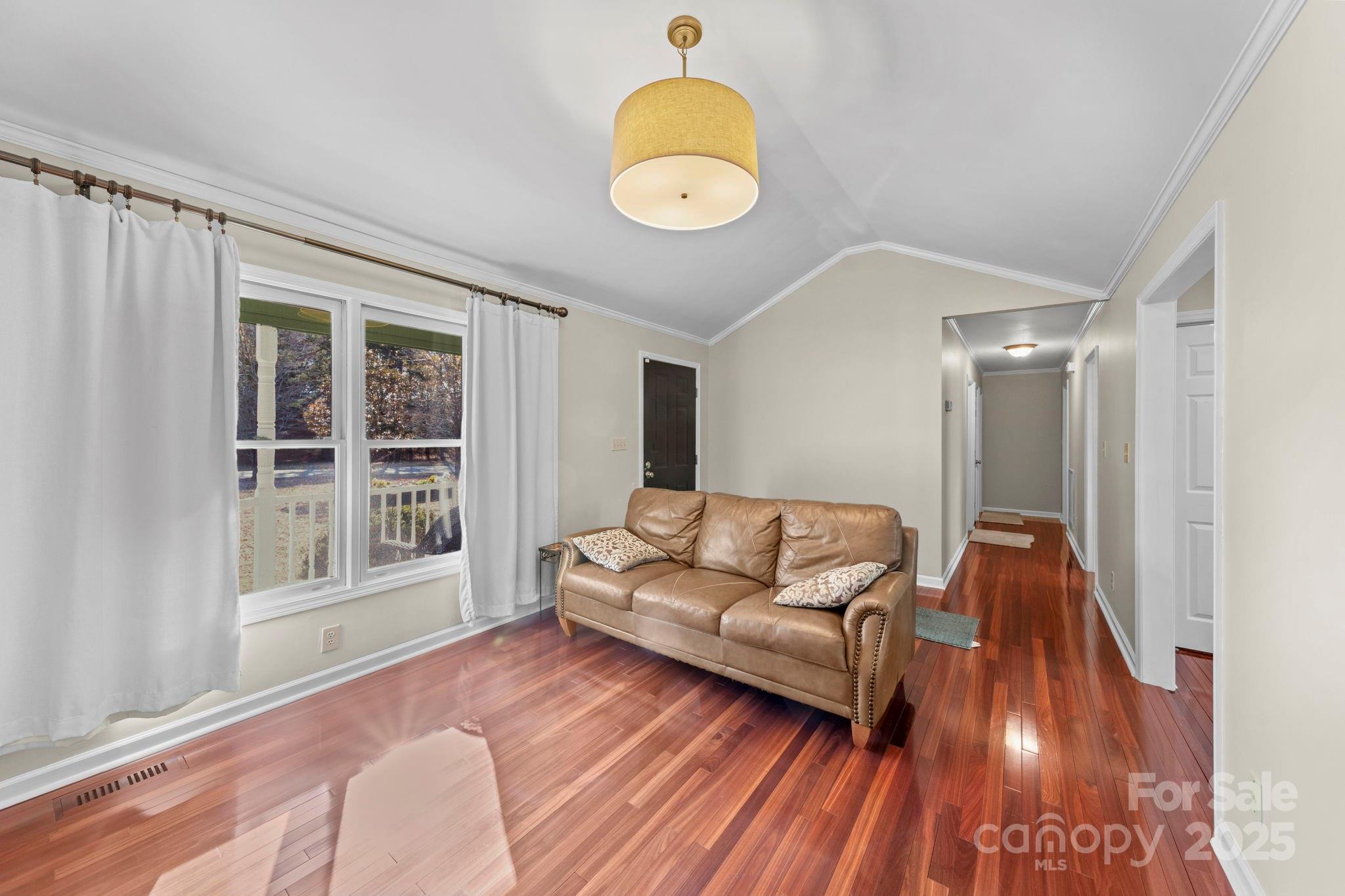 3400 Griffith Road Monroe, NC 28112 - Photo 17 of 46 a living room with furniture and a large window