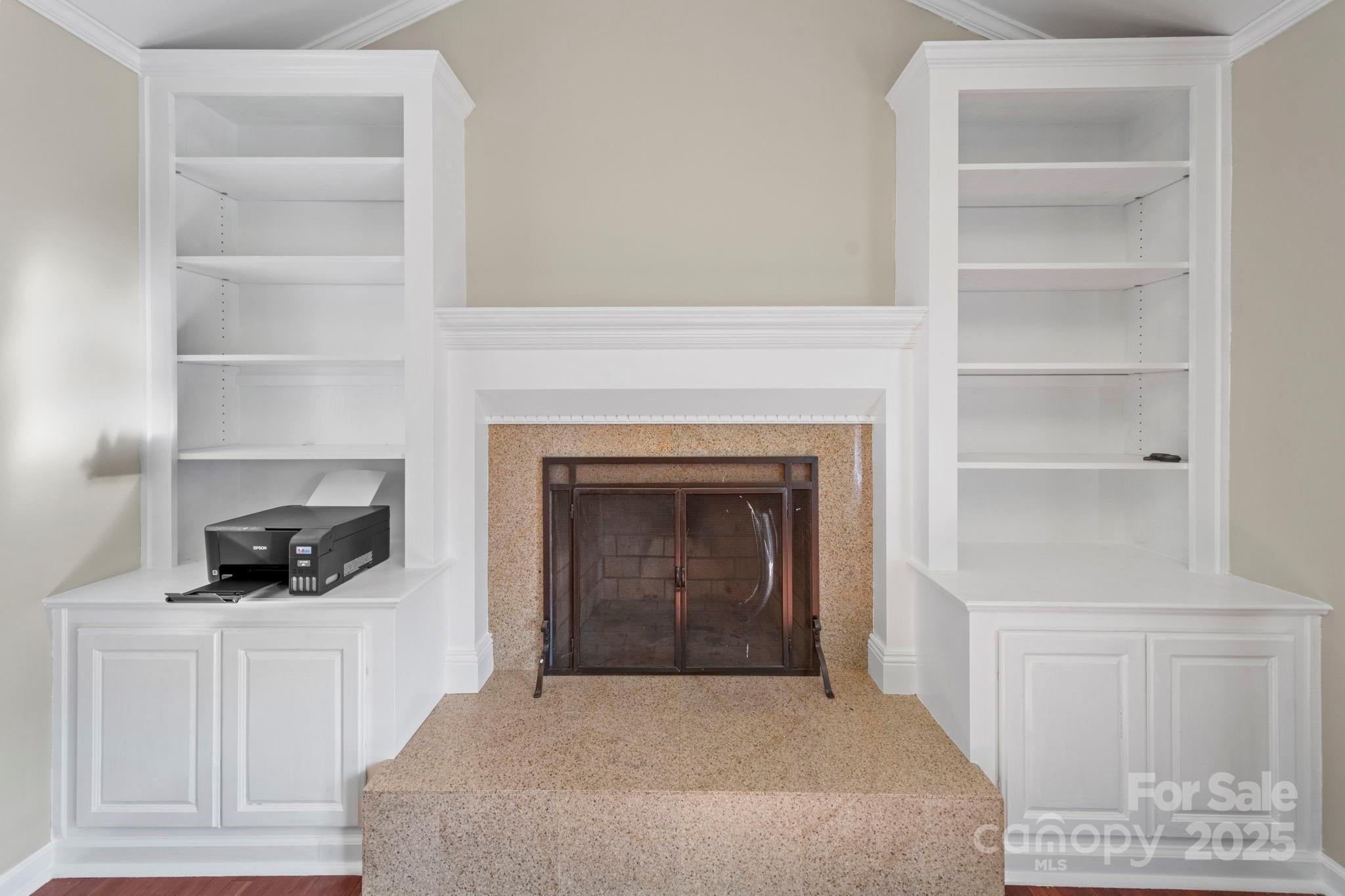 3400 Griffith Road Monroe, NC 28112 - Photo 19 of 46 a bedroom with a bed and a fireplace