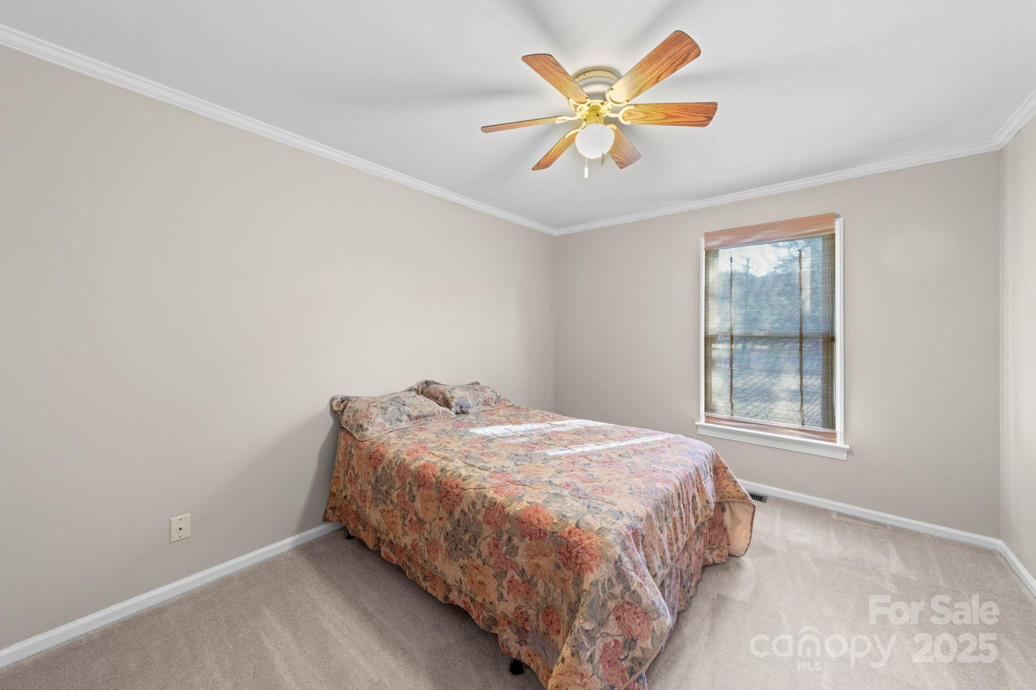 3400 Griffith Road Monroe, NC 28112 - Photo 21 of 46 a bedroom with a bed and a window