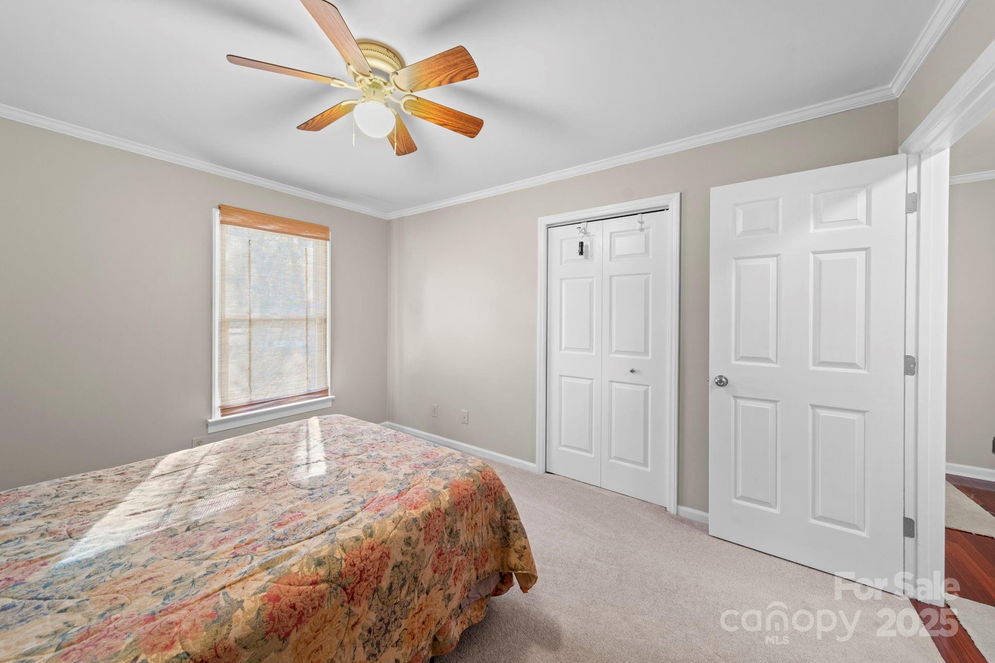 3400 Griffith Road Monroe, NC 28112 - Photo 22 of 46 a bedroom with a bed and a window