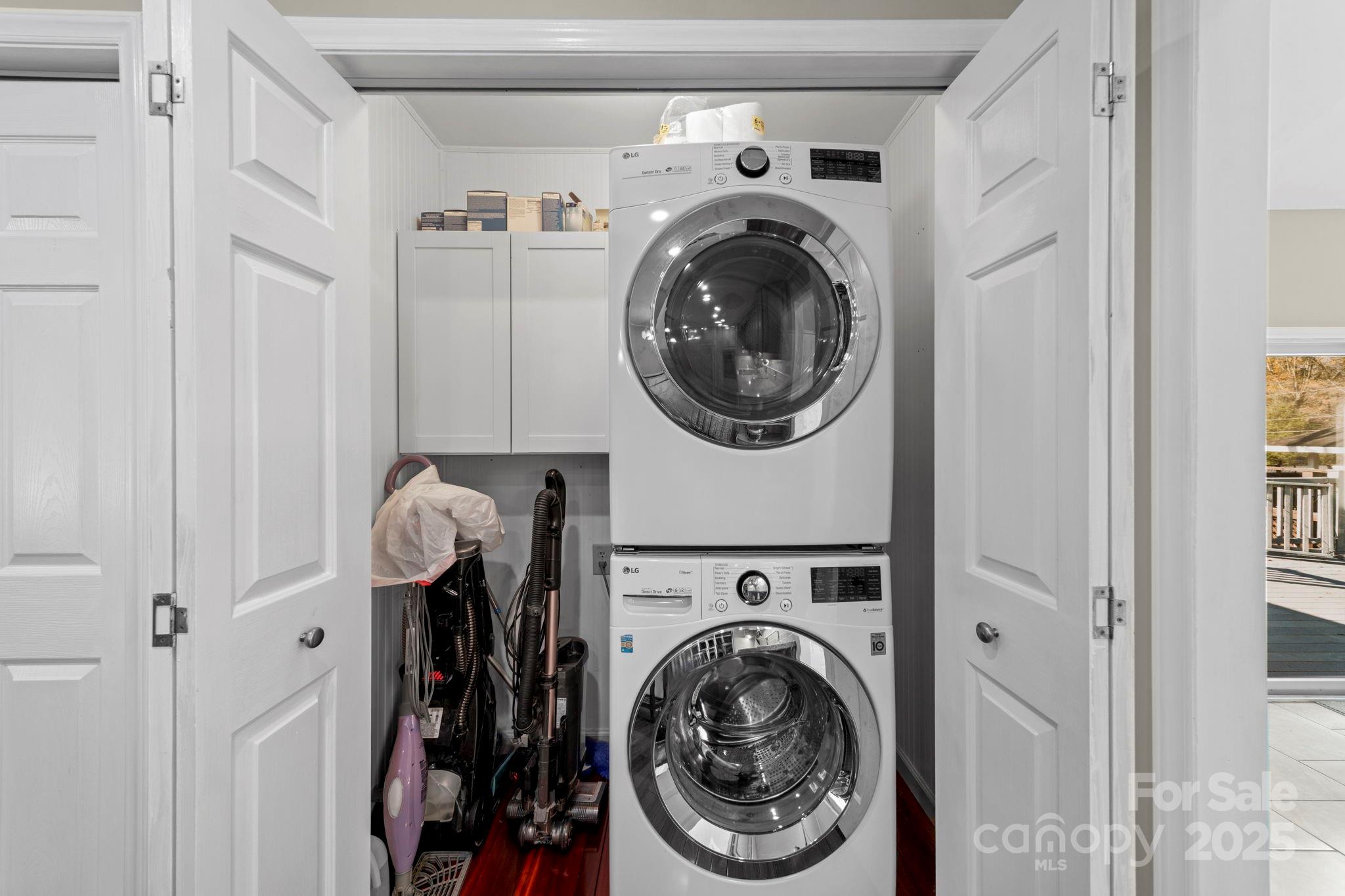3400 Griffith Road Monroe, NC 28112 - Photo 38 of 46 a close view of a storage and utility room with dryer and washer