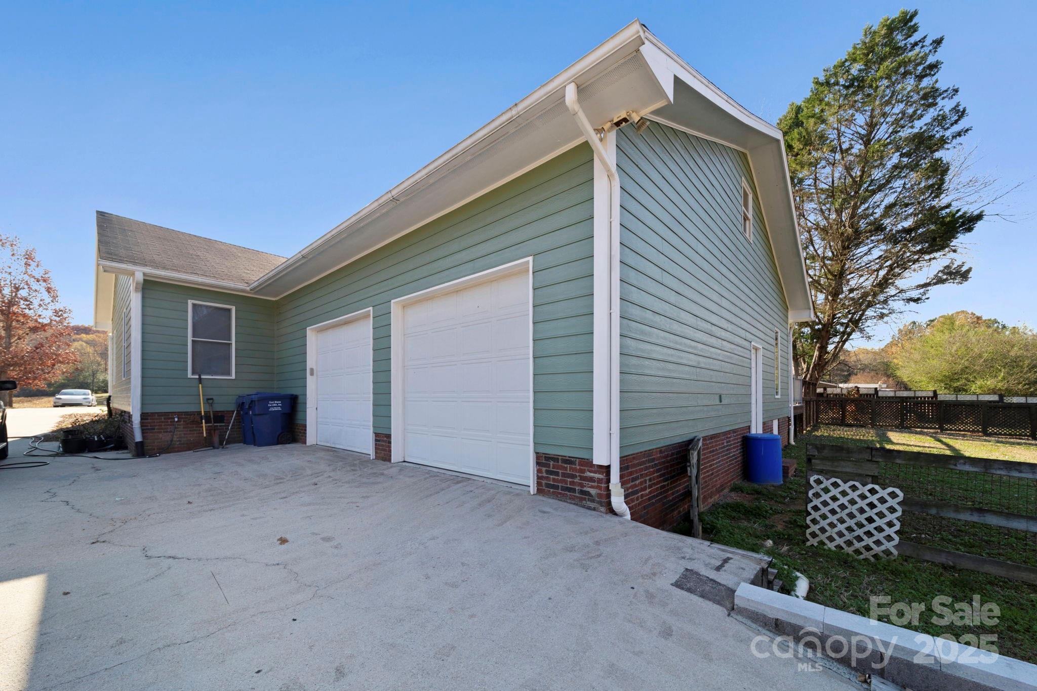 3400 Griffith Road Monroe, NC 28112 - Photo 4 of 46 a view of a house with a yard