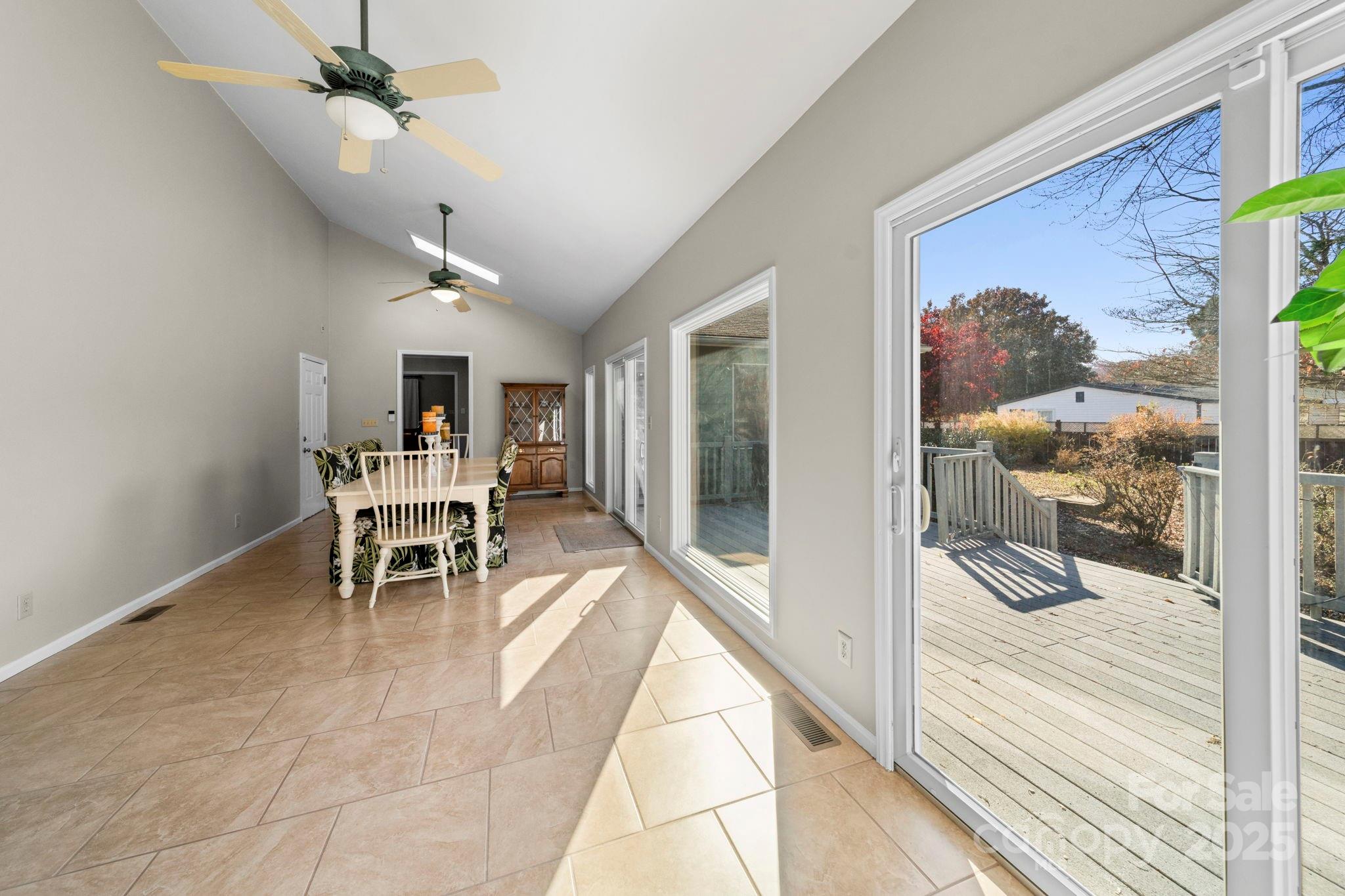 3400 Griffith Road Monroe, NC 28112 - Photo 42 of 46 a dining room with furniture and a floor to ceiling window