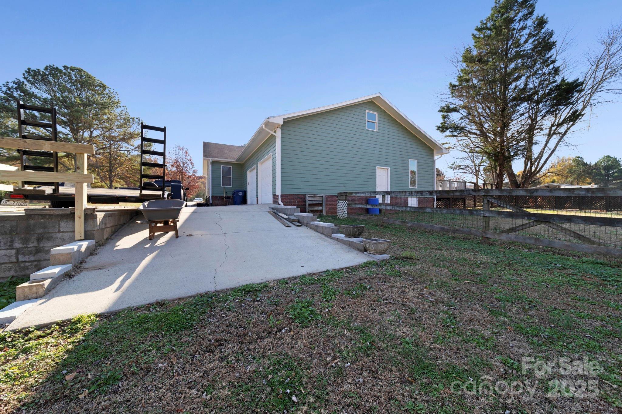 3400 Griffith Road Monroe, NC 28112 - Photo 5 of 46 a view of a house with a yard
