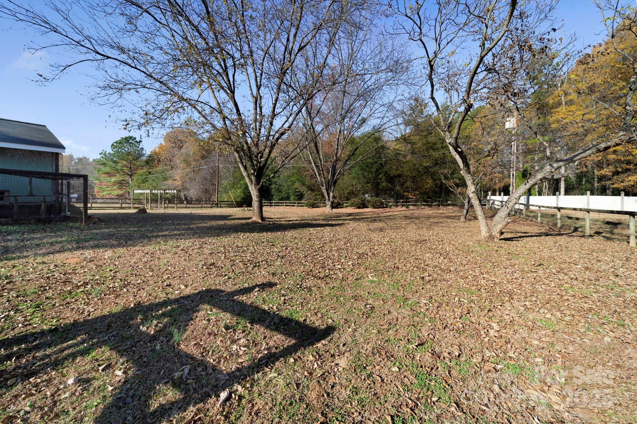 3400 Griffith Road Monroe, NC 28112 - Photo 6 of 46 a view of a yard with trees
